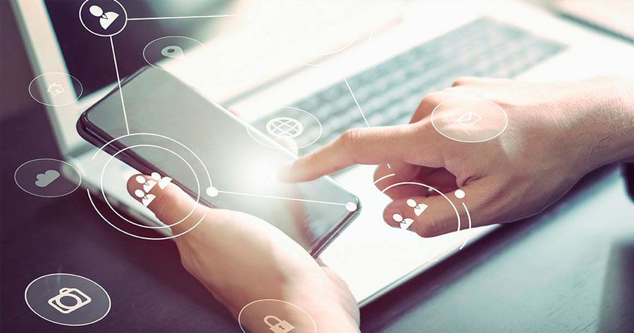 Laptop and smartphone showing digital estate planning apps
