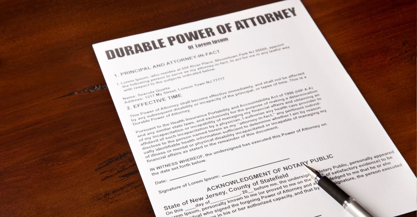 Durable Power of Attorney document and pen on desk