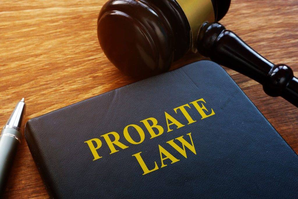Probate law book and gavel representing Florida probate caveat filing process