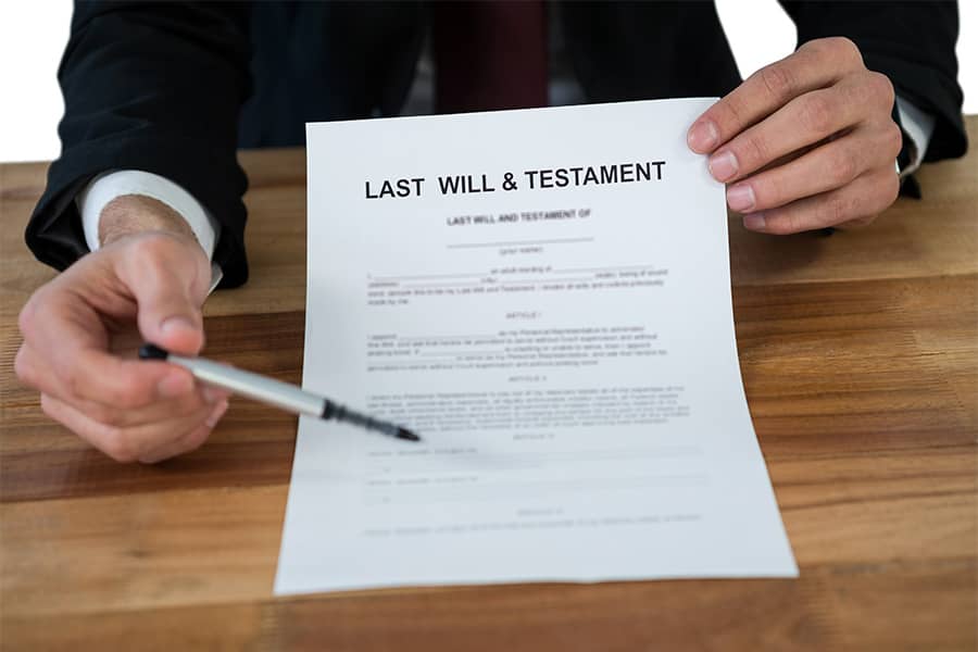 Florida probate lawyer reviewing a will document during a legal consultation
