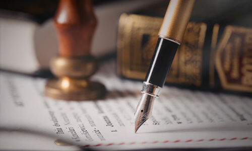 Senior couple reviewing documents together to update their Florida estate plan.